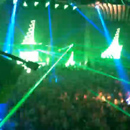 Night club with green and blue lasers